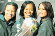 HERE IT IS: PSL boss Kjetil Siem, Pinky Moholi, director of group strategy at Nedbank, and Tom Boardman, the bank's chief executive, at the semifinal draw in Johannesburg yesterday. Pic. Antonio Muchave, 21/04/08. © Sowetan.