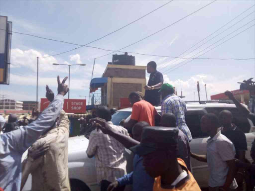 Moses Wetang'ula, who is Bungoma Senator and Ford Kenya leader, with NASA supporters whom he addressed on election chaos in the county, October 27, 2017. /JOHN NALIANYA