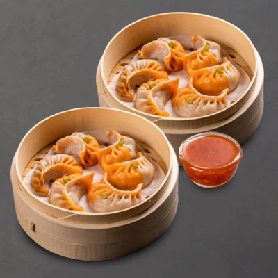 Steamed Chicken Schezwan With Momo Chutney -12 Pcs