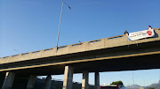 Protesters on a bridge over the N1 in Cape Town on Thursday morning.