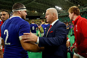 Warren Gatland, Head Coach of Wales talks to Guilhem Guirado of France after the Rugby World Cup 2019 Quarter Final match between Wales and France at Oita Stadium on October 20, 2019 in Oita, Japan. 