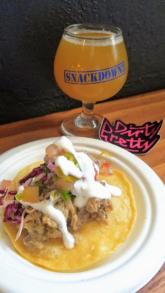 Snackdown 2018 pairing of Loyal Legion/Dirty Pretty + Breakside brought together Spicy Pork Tostada. Crispy corn tortilla, spicy pulled pork, pineapple salsa, slaw, lime crema with the Loyal Legion/Breakside collaboration beer Call Me Hazy Pale