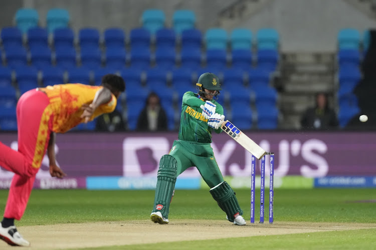 Quinton de Kock playing a shot during the 2022 ICC Men's T20 World Cup match between South Africa and Zimbabwe.
