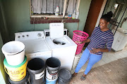 Lungile Nyembe from Ekangala township near Bronkhorstspruit, who works for a laundry service, is frustrated by lack of water to do her washing.