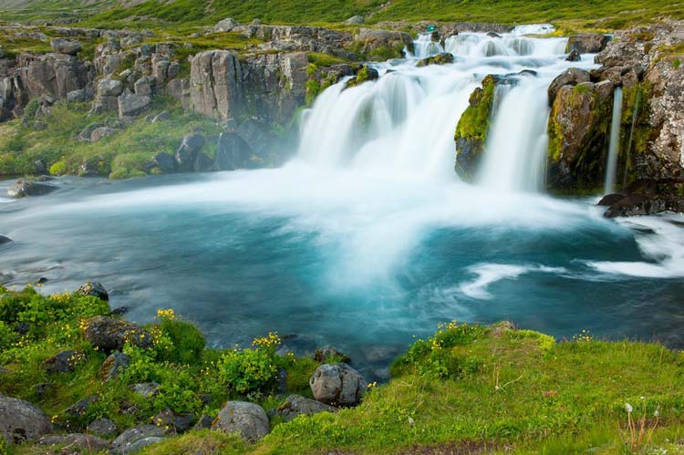 Dynjandi is a series of waterfalls in the Westfjords, Iceland, near the Fosshotel. See it on a Windstar cruise.