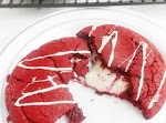 Red Velvet Cheesecake Filled Cookies Drizzled with White Chocolate was pinched from <a href="https://www.facebook.com/photo.php?fbid=439612886111857" target="_blank">www.facebook.com.</a>