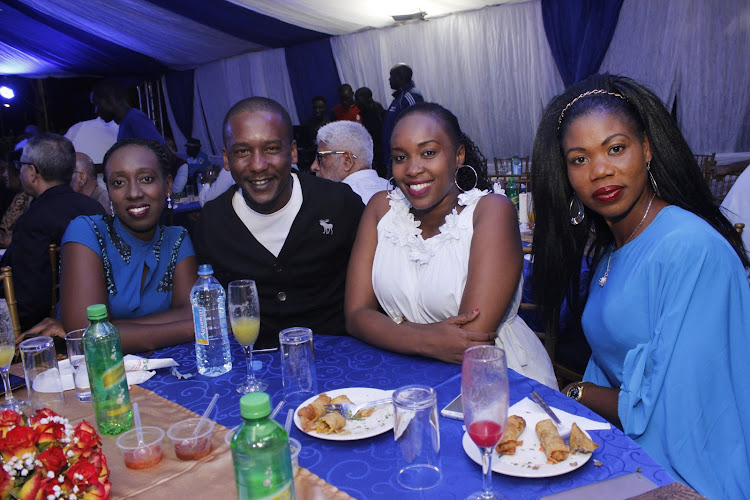 RAG business executive Leila Owino, Classic 105's Mike Mondo and RA business executives Corazon Oganda amd Mary Awuor