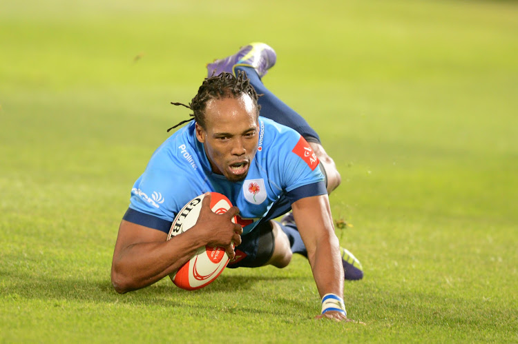 Akona Ndungane of the Bulls scores during the Absa Currie Cup match between Vodacom Blue Bulls and GWK Griquas at Loftus Versfeld on October 11, 2014 in Pretoria, South Africa.