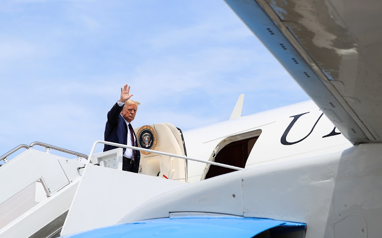 US President Donald Trump boards Air Force One as he departs on campaign travel, at Joint Base Andrews, Maryland, the US, on August 20 2020.