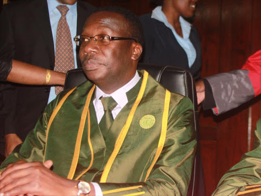 Supreme Court Judge Smokin Wanjala (left) and former Chief Justice Willie Mutunga