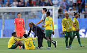Desiree Ellis, Head Coach of South Africa consoles her players following their defeat in the 2019 FIFA Women's World Cup France group B match between South Africa and Germany at Stade de la Mosson on June 17, 2019 in Montpellier, France. 