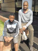 FAMILY TIES: Itumeleng Khune with younger brother and teammate Lucky. Pic. LEBOGANG BOSHOMANE. Circa September 2009. © Unknown.