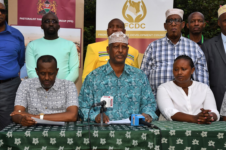 The patron Pastoralists Parliamentary Group and Saku MP Dido Raso addresses the press in Naivasha flanked by fellow legislators