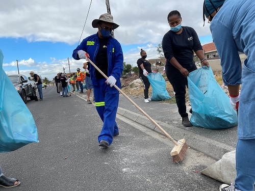 City of Cape Town workers cleaning the streets and clearing flood water systems.