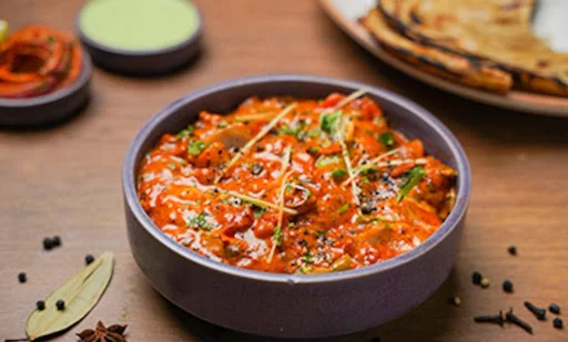 Boneless Butter Chicken (4 pcs) with 2 Butter Naan