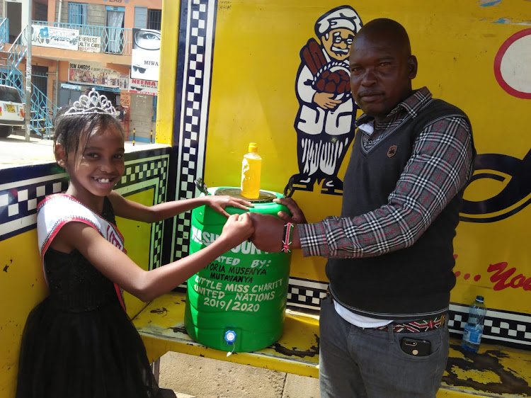 Kamwatu Malonza, Mwingi taxi Chair receives water tank and sanitizer from Musenya Victoria, Little Miss Charity 2019-2020