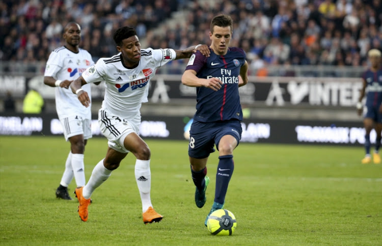 Giovani Lo Celso of PSG, Bongani Zungu of Amiens (left) during the Ligue 1 match between Amiens SC and Paris Saint Germain (PSG) at Stade de la Licorne on May 4, 2018 in Amiens, France.