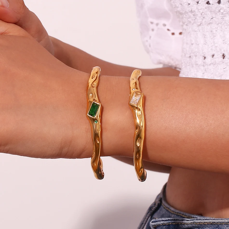 Roestvrijstalen armband met onregelmatige rechthoekige zirkonia en 18K goud vergulding, voor een stijlvolle look.