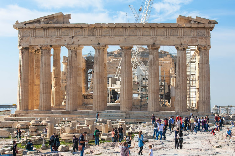 The Parthenon, a former temple on the Acropolis in Athens, was dedicated to the goddess Athena.