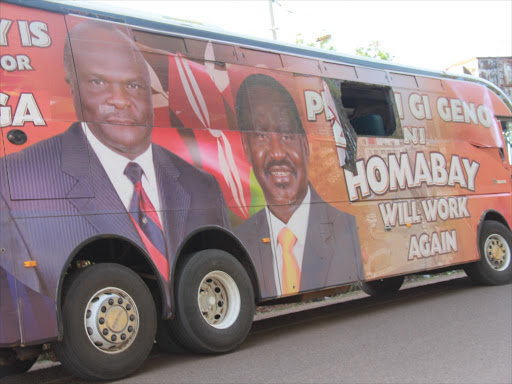 The ODM-branded bus that was stoned by youths during a stopover in Aros trading centre, Karachuonyo, Homa Bay county, March 13, 2017. /HABIL ONYANGO