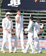 Proteas fast bowler Marco Jansen celebrates the wicket of KL Rahul of India with teammates.