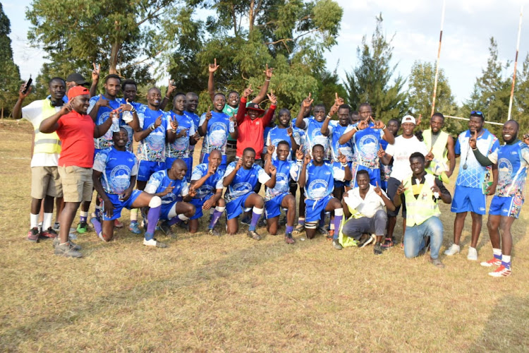 Kisumu RFC players and officials pose for a photo during a recent match