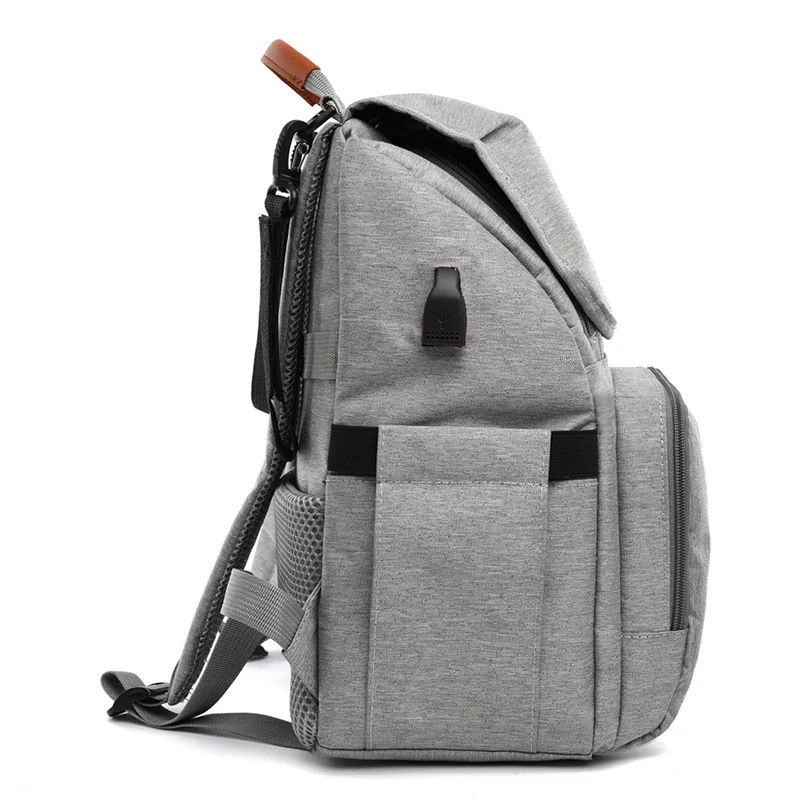 Multifunctional large capacity mommy backpack for organized parents. Spacious, with multiple compartments and convenient