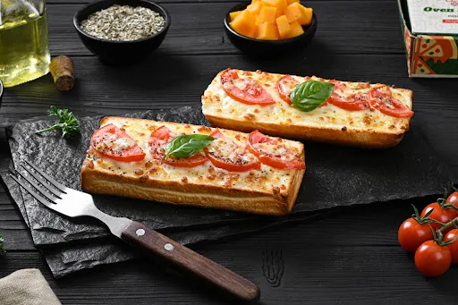 "Toasty With Topping Of Cheesy Herbed Tomato (2 Pcs)"