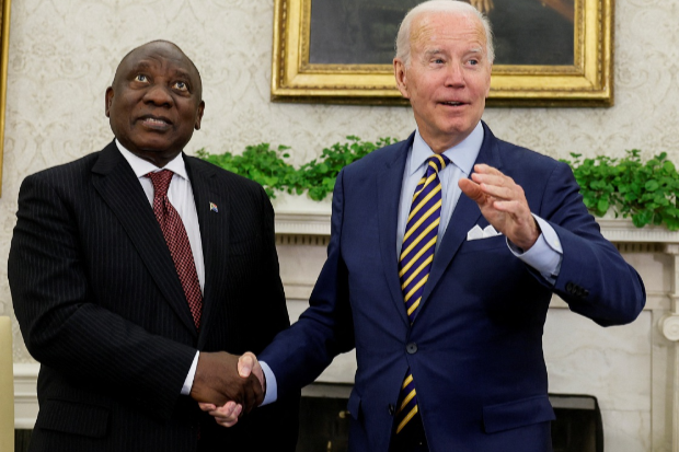 President Joe Biden greets President Cyril Ramaphosa in the Oval Office at the White House in Washington.