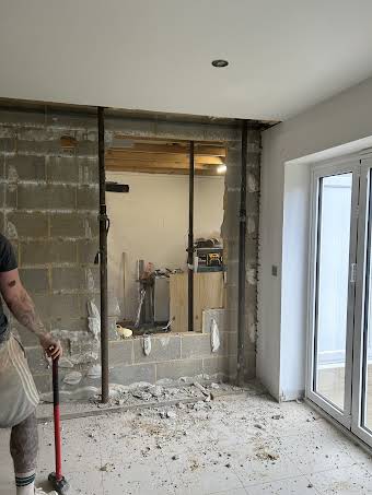 Garage conversion into kitchen dinning room and lounge  album cover