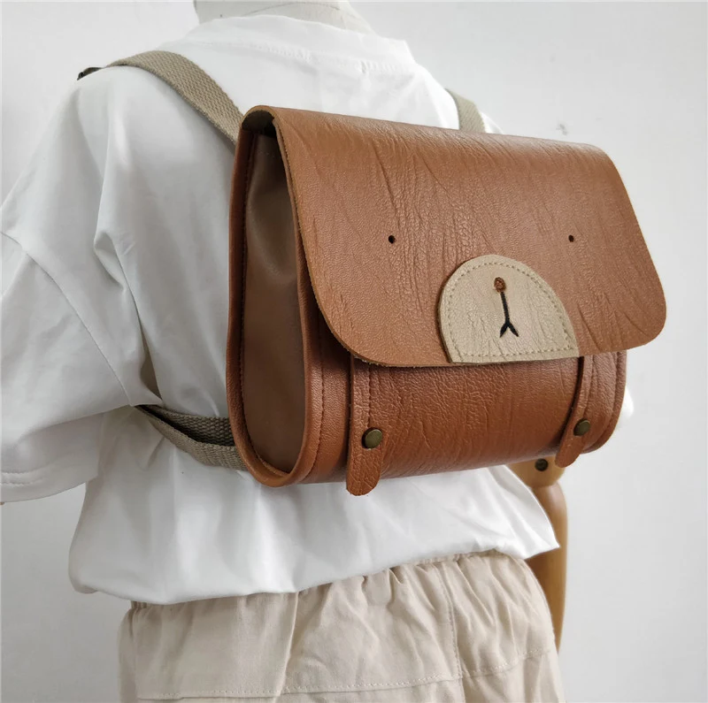 Little Bear Feel kinder schooltas met klinknagels, een veelzijdige speel- en schooltas. De perfecte all-match tas voor kinderen.
