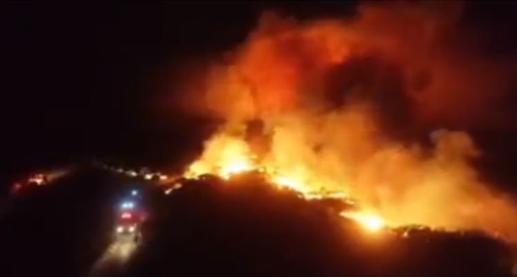 The massive fire after the firefighter helicopter crash in Cape Town.