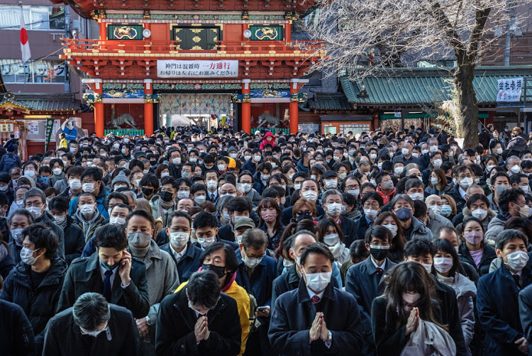 People offer prayers on the first business day of the year at the Kanda Myojin shrine on January 4 2022 in Tokyo, Japan. Picture: GETTY IMAGES/CARL COURT