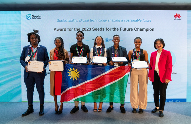 A section of youth pose with their awards for the 2023 Seeds for the Future Champion during the summit.