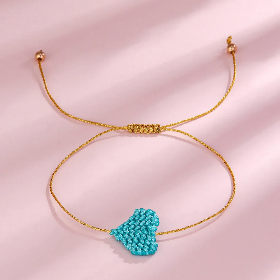 Chaîne d'amitié bohème tissée à la main, colorée et simple, avec une corde d'amour. Un symbole d'affection unique et vibrant pour vos proches.
