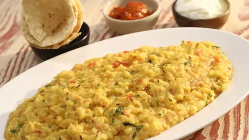 Butter Khichdi + Aloo Paratha + Papad + Pickle + Salad + Fry Mirch