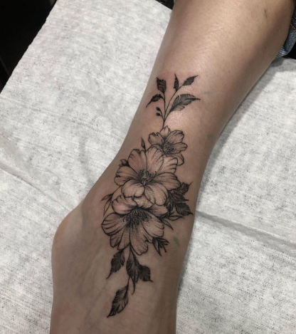 great flower tattoo for leg