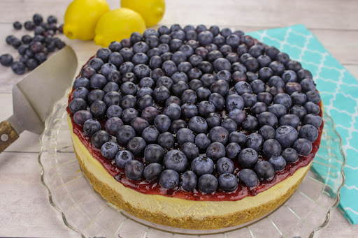 Blueberry Cheesecake with blueberries on top.