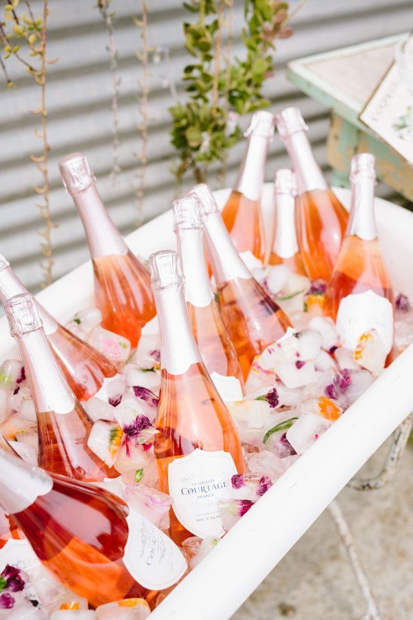 How To Host One Epic Galentine’s Day Brunch - Champagne in an ice bucket