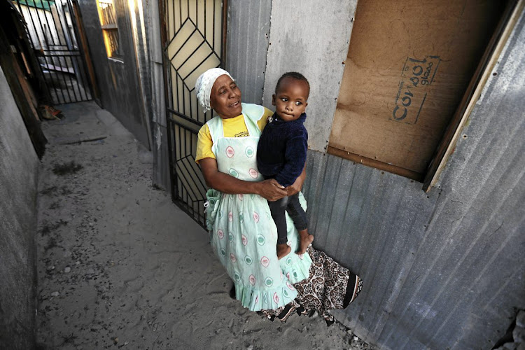 Sintuntu Tshandana with her grandson in Browns Farm in Philippi.