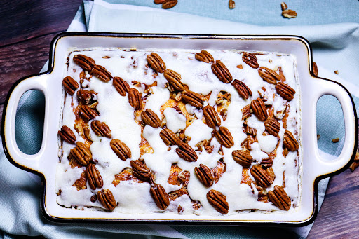 Jane's Cheesy Pecan Cake ready to be sliced.