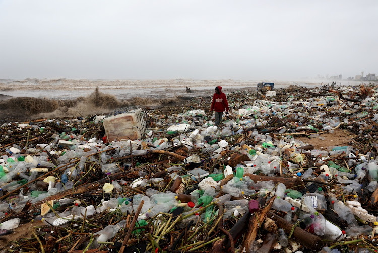 A fuel container and rubbish washed onto the beach at Blue Lagoon in Durban.