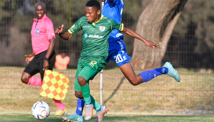 Baroka FC’s Kabelo Kgositsile and Platinum City Rovers Pealvince Madonsela. Baroka players claim they had a bleak festive season after being dribbled over salaries. Picture: SYDNEY MAHLANGU/BACKPAGEPIX