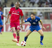 Xola Mlambo, left, seen here with SuperSport's Dean Furman, has come under criticism from some Orlando Pirates fans over his dip in form lately.