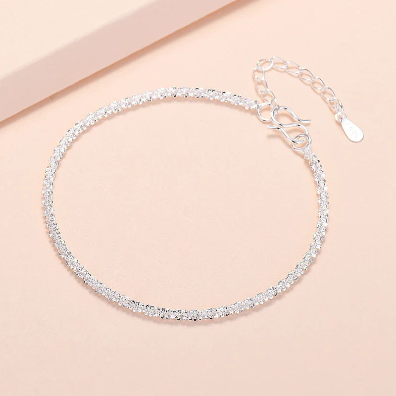 Title 26, Pulseira geométrica prateada para mulheres Aces...