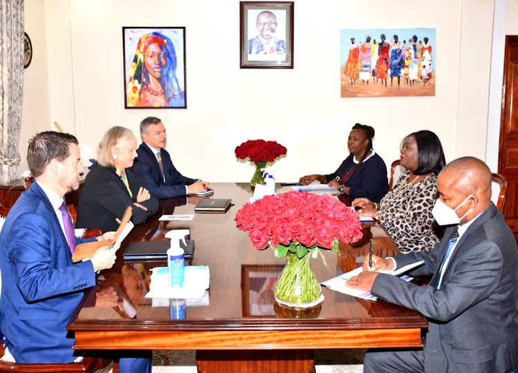 CS Amb. Raychelle Omamo with US Ambassador to Kenya Margaret Whitman in a meeting with other delegates.