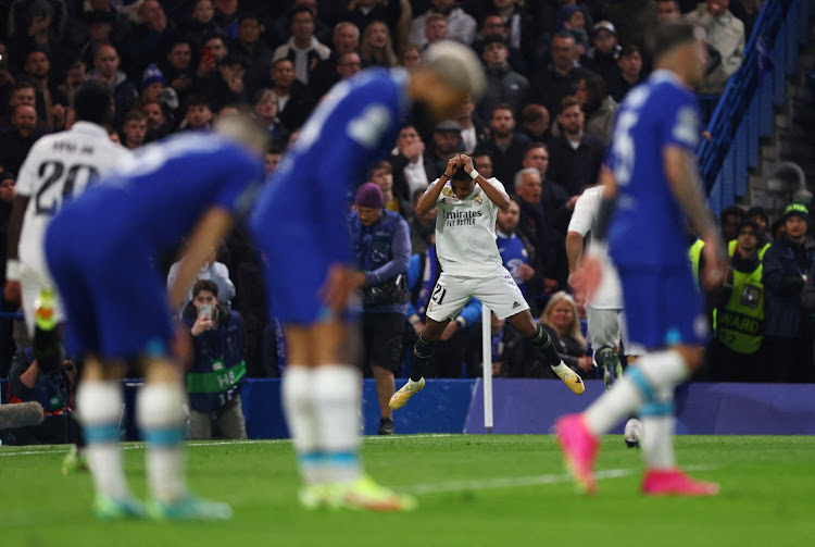 Real Madrid's Rodrygo celebrates scoring their first goal in their Uefa Champions League quarterfinal second leg game against Chelsea at Stamford Bridge in London on April 18 2023.