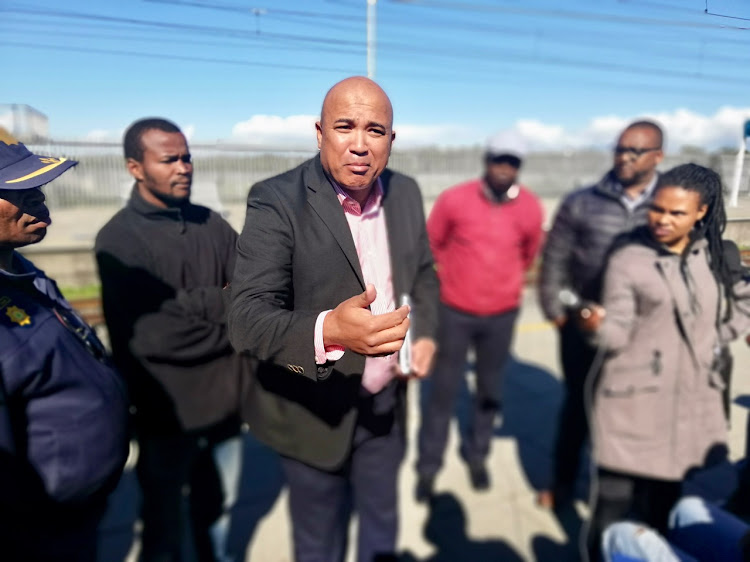 Metrorail's regional manager in the Western Cape, Richard Walker, meets commuters.