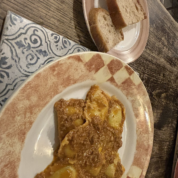 Ravioli with meat sauce butter and cheese, plus gf bread