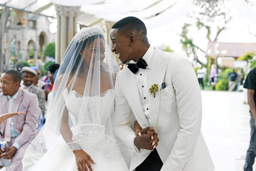 Tumi and Zolani Dlamini during their wedding.